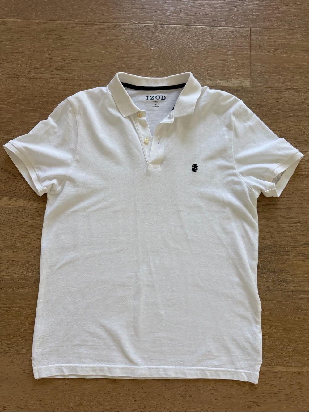 Izod White Polo Shirt with Small Black Logo
